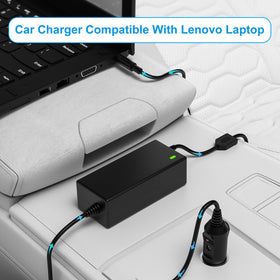 vhbw charger plugged into car socket charging a Lenovo laptop on road