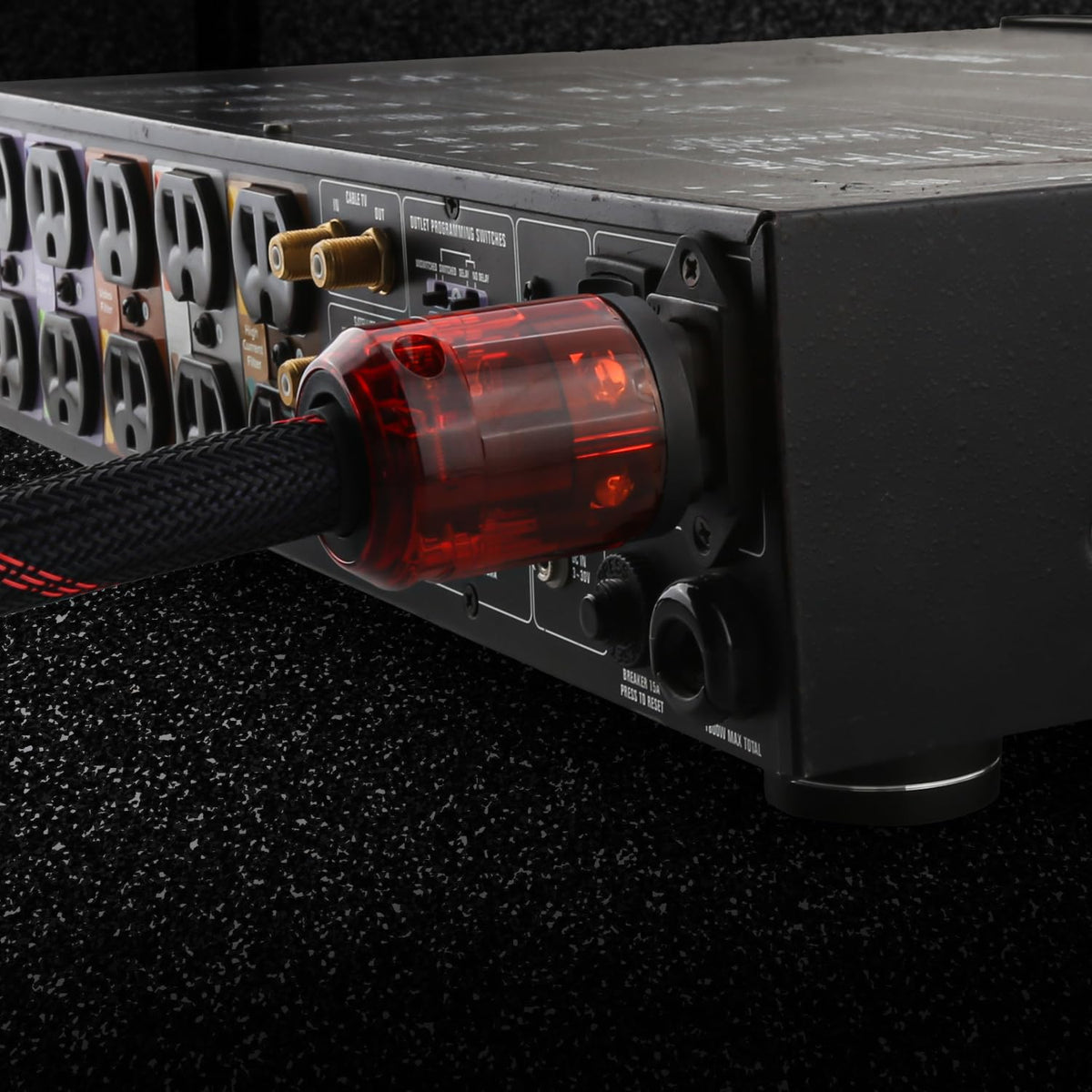 Viborg cord plugged into amplifier rear panel demonstrating snug fit