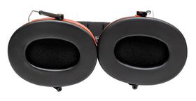 Vic Firth headphones next to drumsticks showing scale and musician-ready benefit