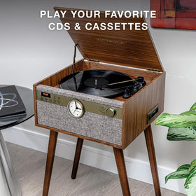 Victrola Century Signature+ CD and cassette area highlights multi-format playback flexibility.