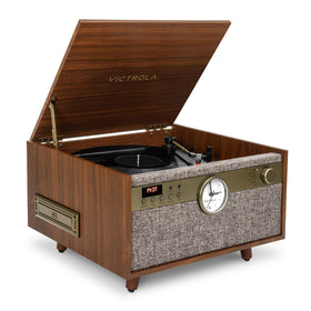 Victrola Century Signature+ clock-lit front view enhances living room ambiance.