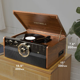 Victrola Empire living room setup blends retro charm with modern convenience.