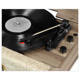 Victrola Highland analog FM tuner with LED dial for nostalgic listening.