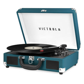 Victrola Journey blue coral suitcase design with portable built-in speakers for on-the-go listening.