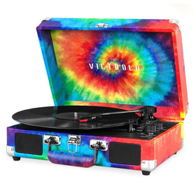 Victrola Journey front closed tie-dye suitcase showing portability and vintage style benefit