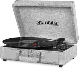 Victrola Journey open playing a vinyl record, Bluetooth convenience shown