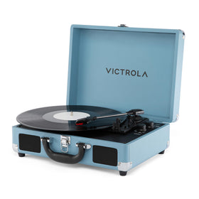 Victrola Journey II blue suitcase with open lid for portable listening.