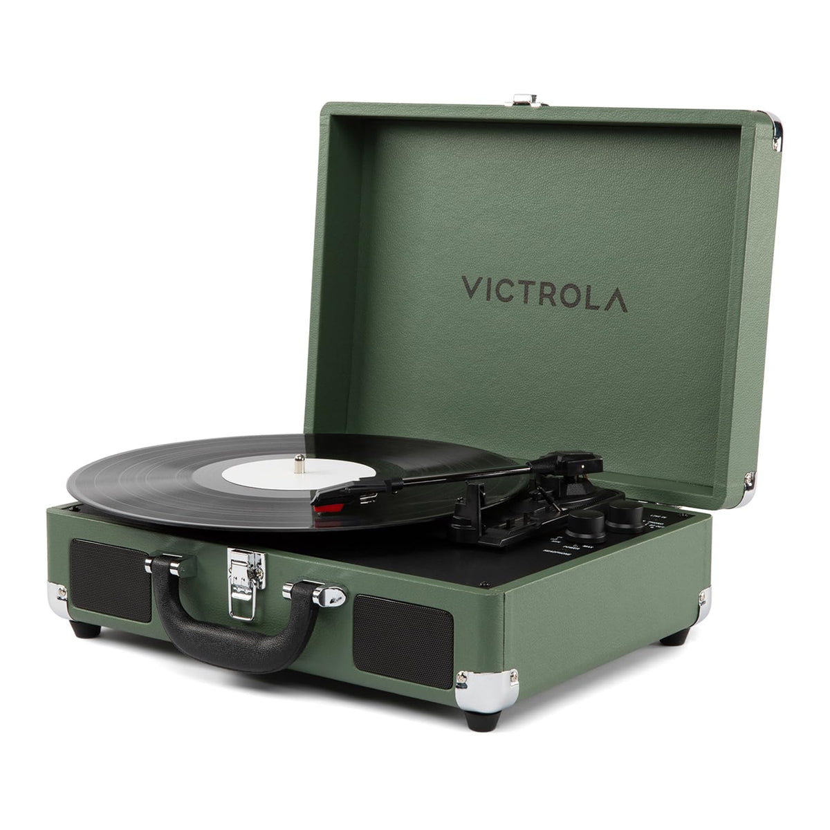Victrola Journey II green suitcase open, ready for on-the-go listening at a cozy setup.