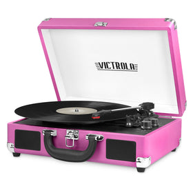 Victrola Journey pink suitcase closed, ready for portable vinyl listening on the go.