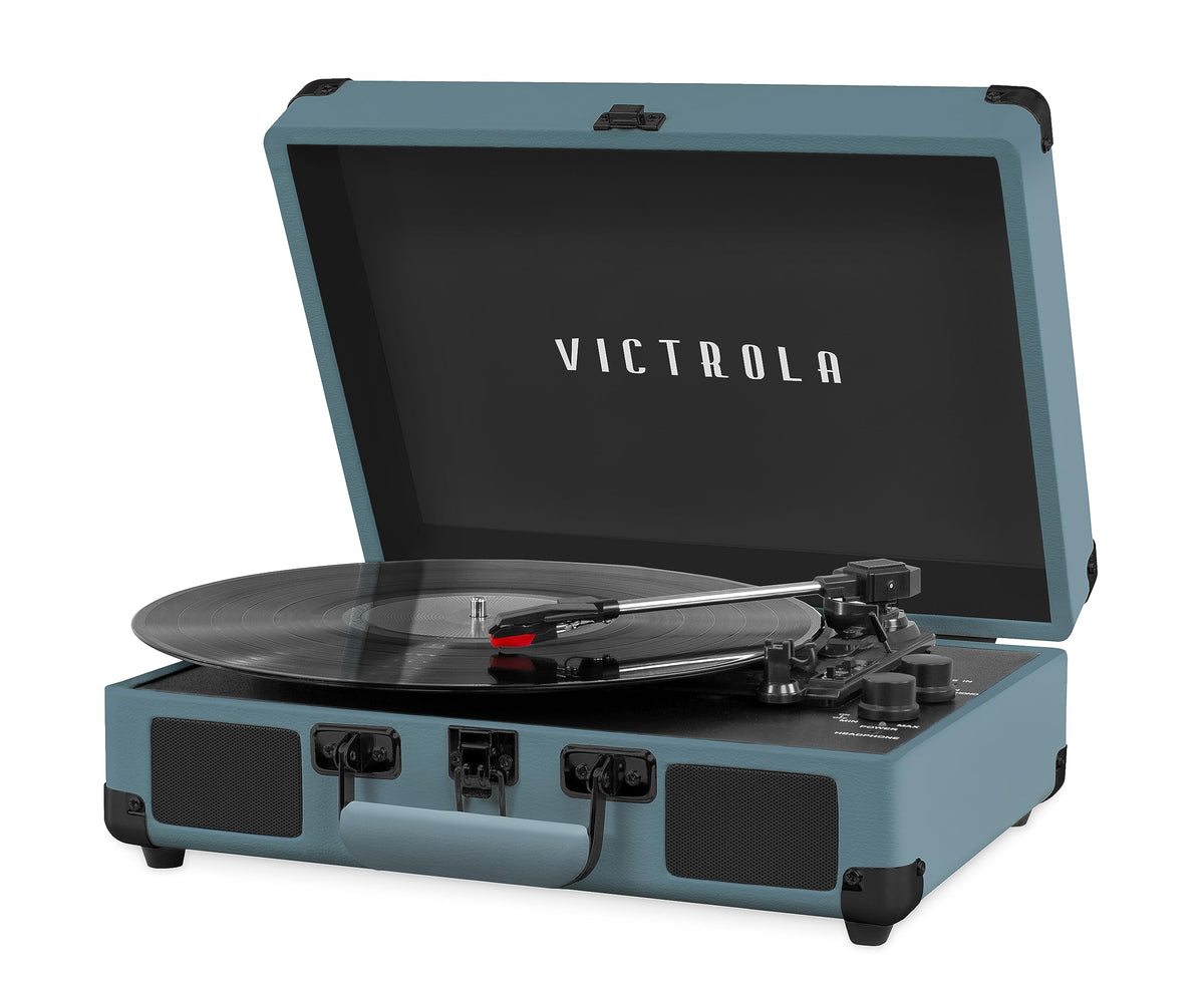 Victrola Journey smoky blue suitcase exterior with carrying handle enables portable listening anywhere