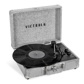 Victrola Journey+ closed suitcase front showing portable design and secure latch benefit