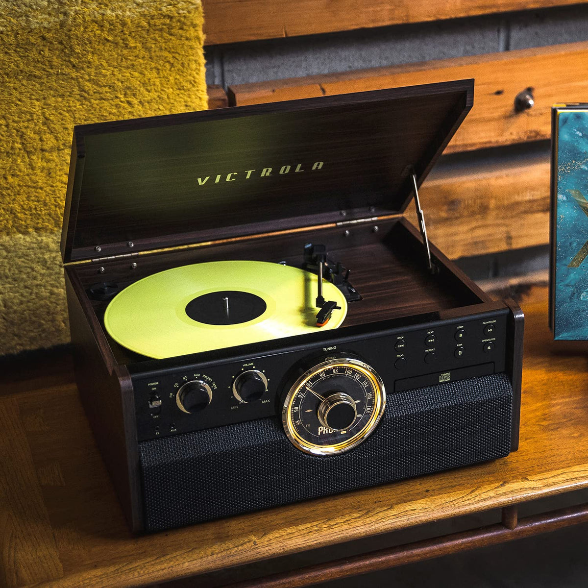 Victrola Metropolitan espresso belt-driven turntable supports 33 to 78 rpm for diverse records.