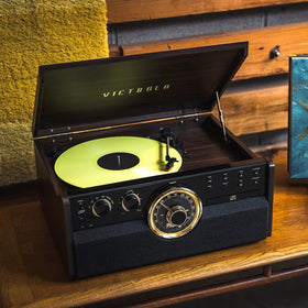 Victrola Metropolitan espresso belt-driven turntable supports 33 to 78 rpm for diverse records.