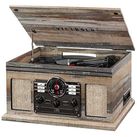 Victrola Quincy 6-in-1 entertainment center in a living room, ideal for vinyl playback and Bluetooth streaming.