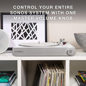 Victrola Stream Carbon illuminated control knob for easy playback control.