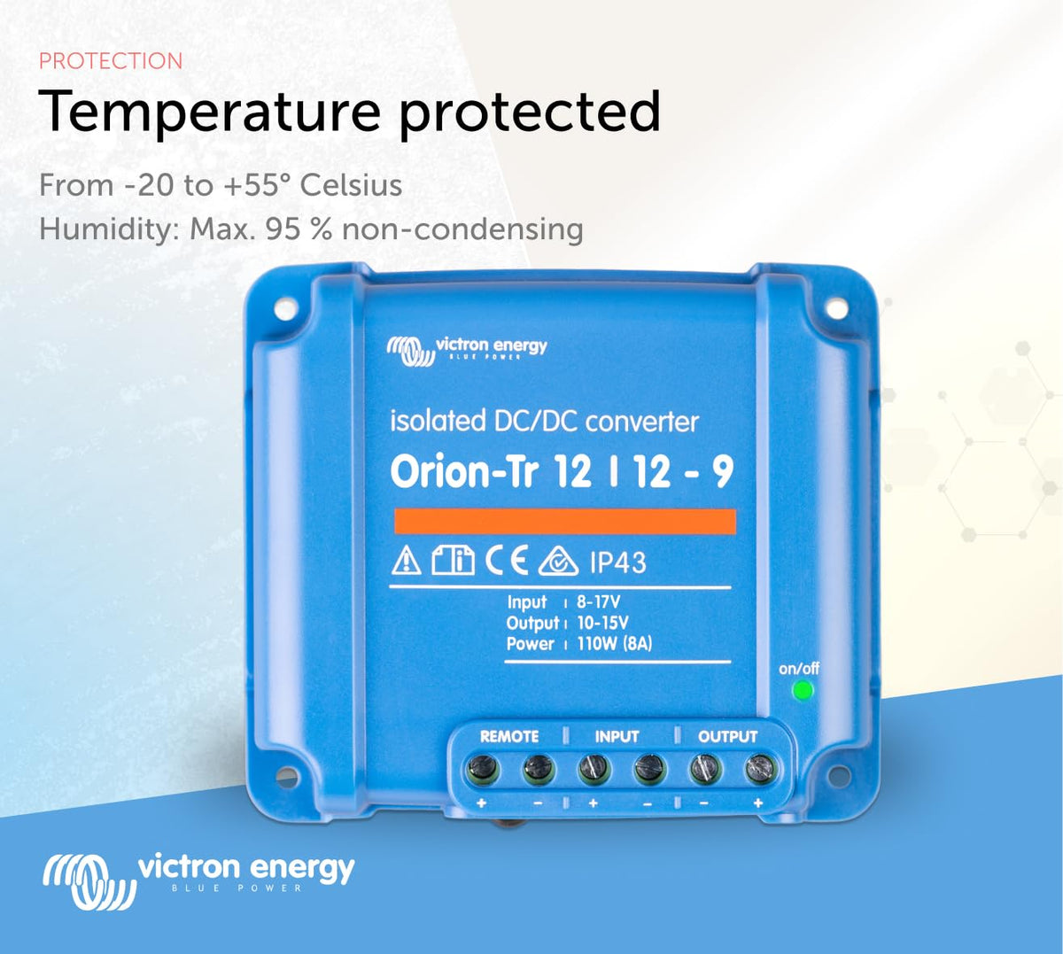 Victron Energy Orion‑Tr next to a hand for scale, demonstrates compact size and easy placement