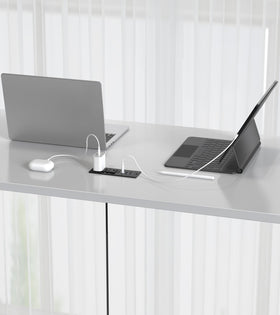 VILONG lifestyle image in home office showing tidy cords and improved ergonomics