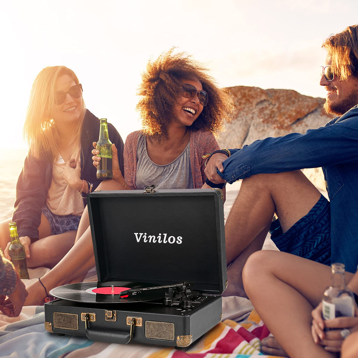 VINILOS in a living room setup demonstrating compact design and social listening