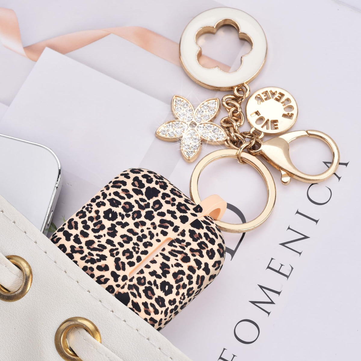 VISOOM AirPods 3 pink case with bling keychain for stylish carry.