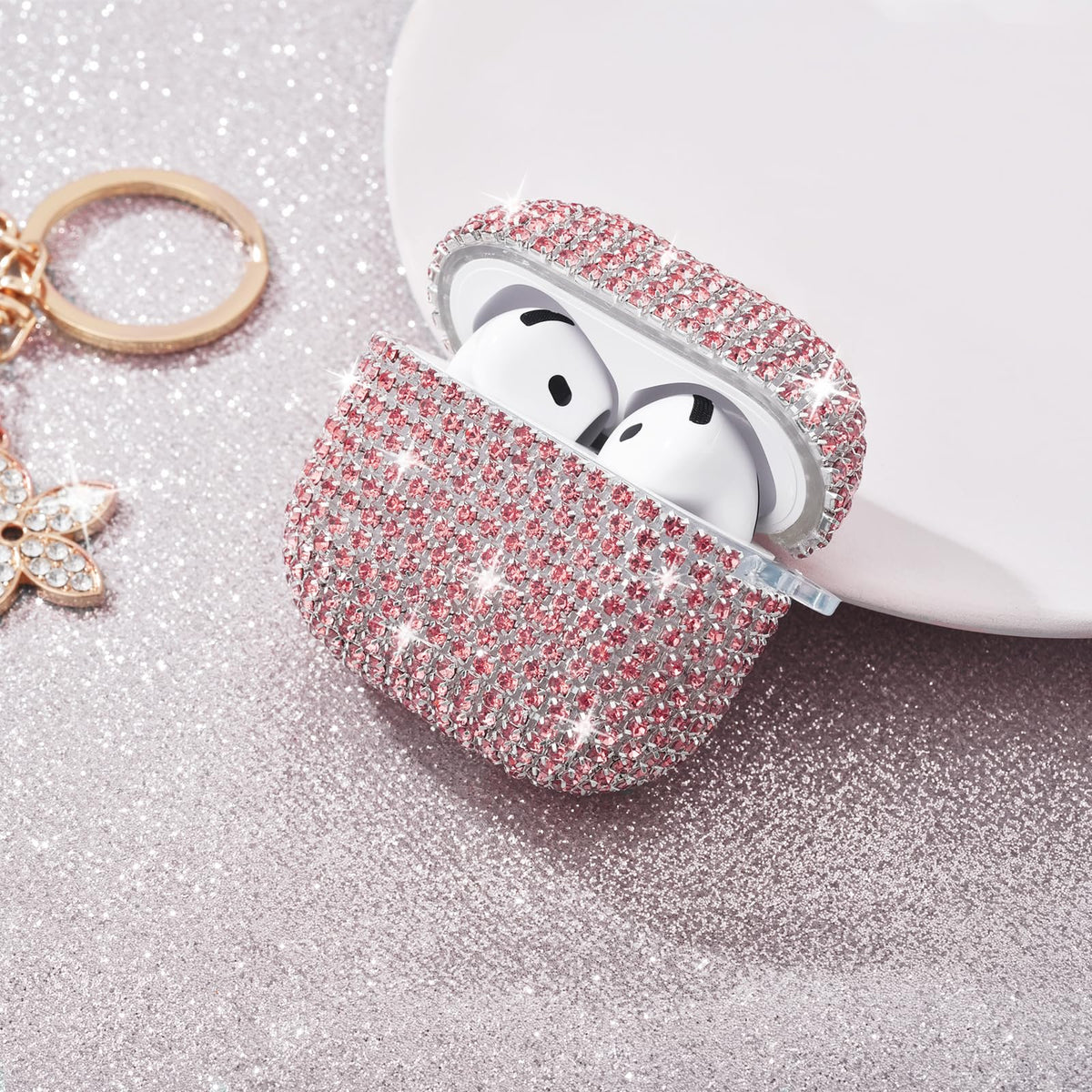 Visoom AirPods 4 Gen glitter case shines on a bag or keychain.