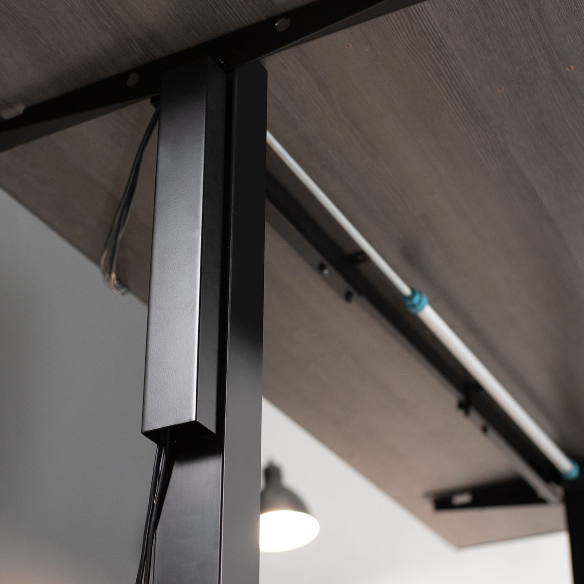 VIVO DESK-AC01-1MB magnetic strips attach securely to the desk leg.