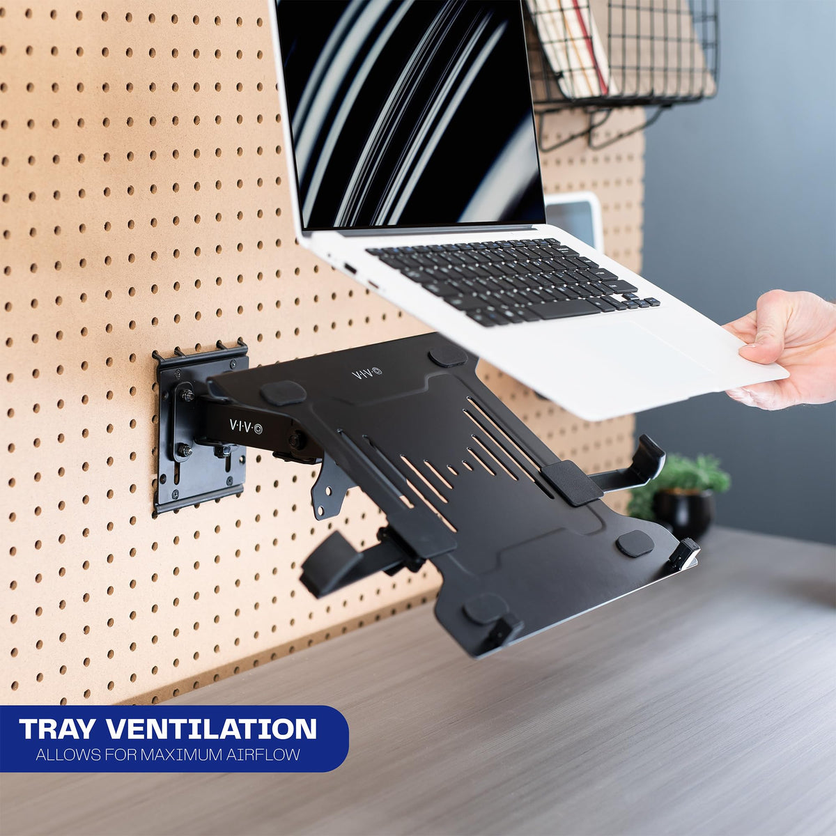 VIVO metal prongs inserted into pegboard holes for stable mounting