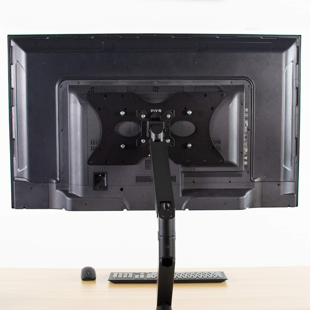 VIVO Steel VESA adapter plate matte black finish blends with displays.