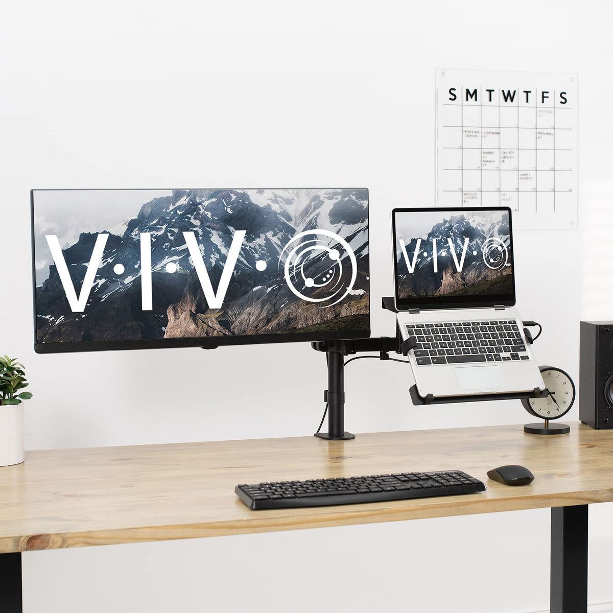 VIVO arm tilted and swiveled to show flexible ergonomic viewing angles