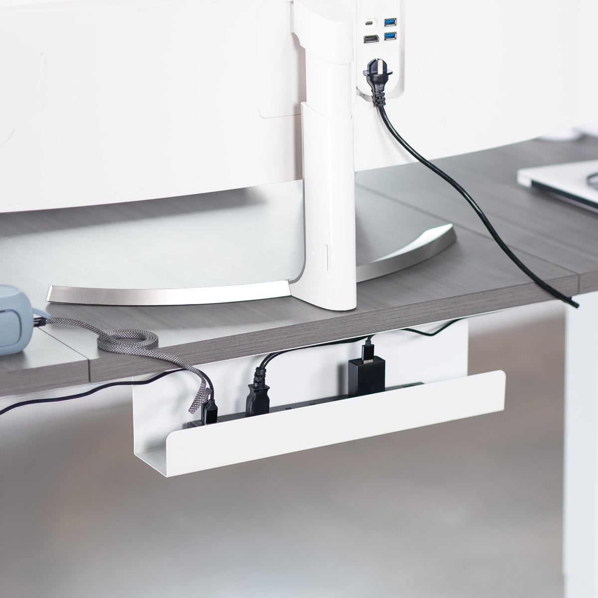 VIVO tray mounted under desk side angle demonstrating neat organization