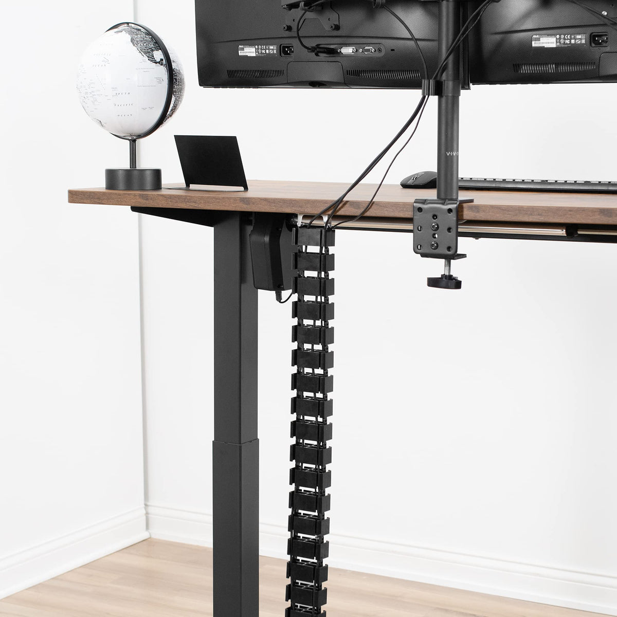 VIVO Vertebrae four-foot strip channels cords from desk to floor
