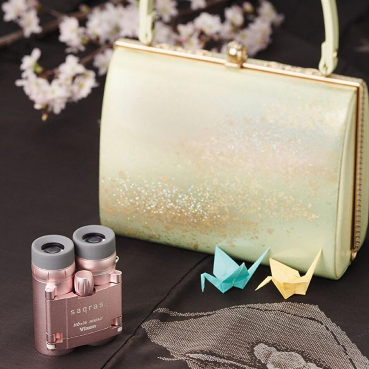 Vixen Optics Opera Glass pink packaging closeup illustrating compact case and storage