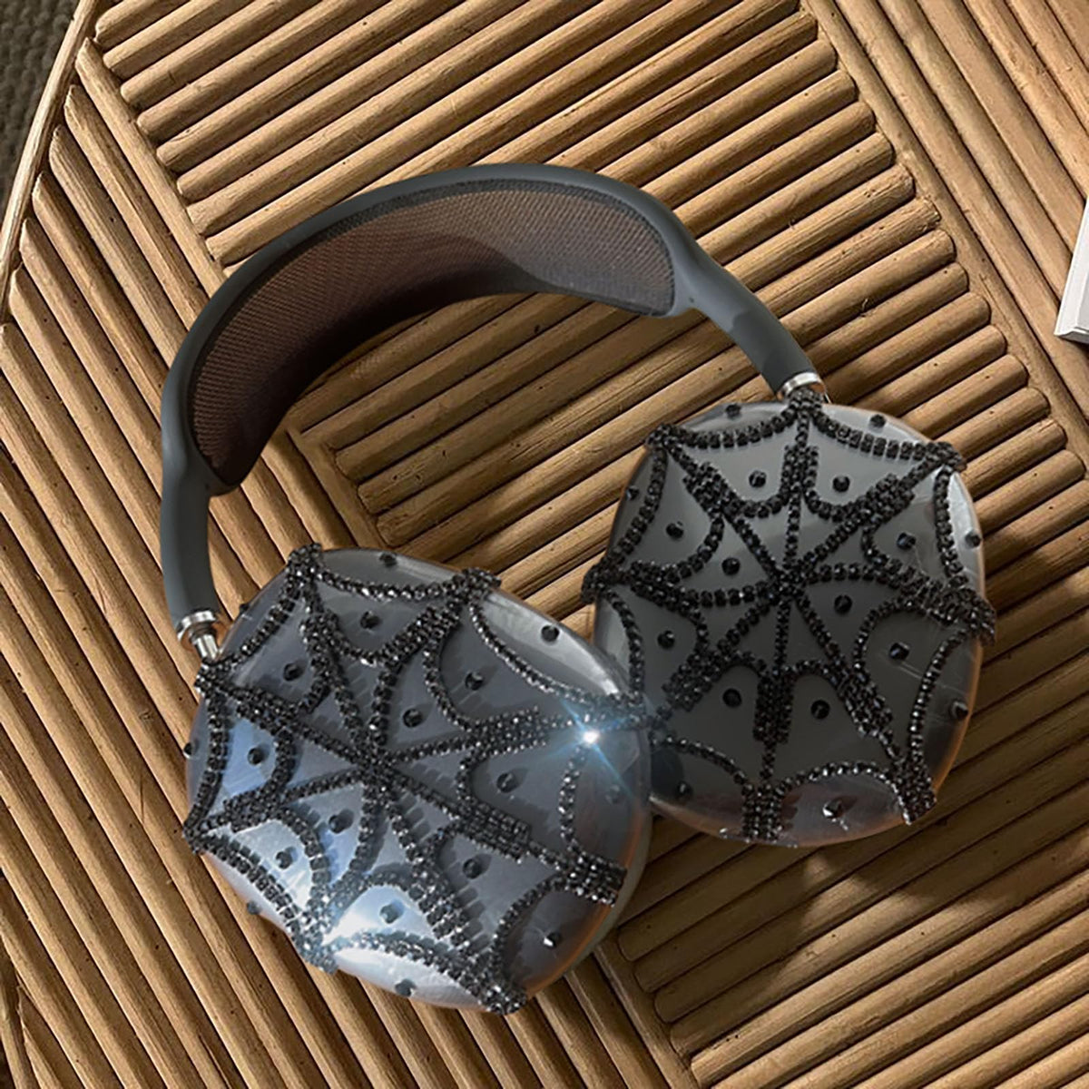 Vodafulgir AirPods Max case with rhinestones offers stylish spider web design for protection.