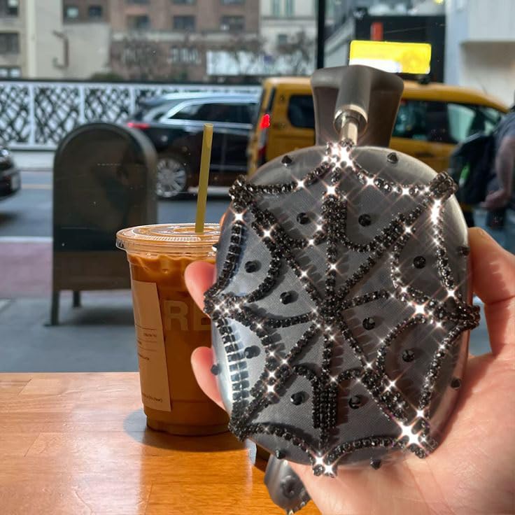 Vodafulgir black glitter AirPods Max cover with rhinestones for subtle shine.