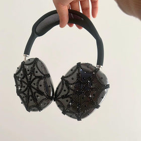 Vodafulgir spider web rhinestones add glamorous detail while guarding against scratches.