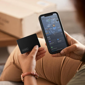 Vodeson placed inside a wallet card slot for discreet tracking