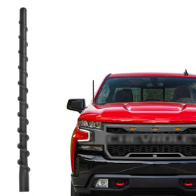 VOFONO carwash-proof antenna on Chevy Silverado closeup, showcasing durable metal and rubber wrap.