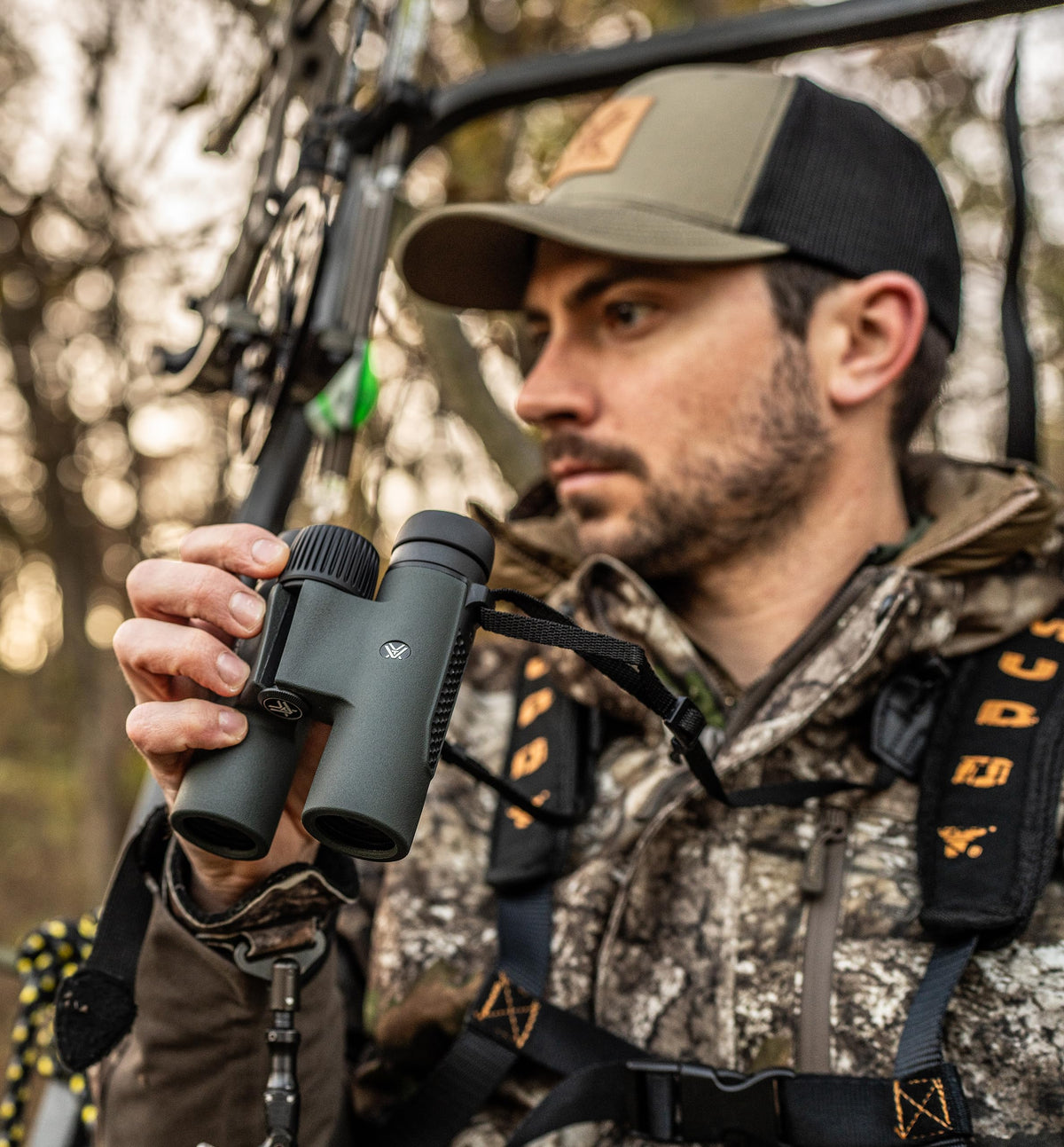 Vortex Triumph HD 10x28 binoculars warranty seal highlighting unlimited VIP coverage.