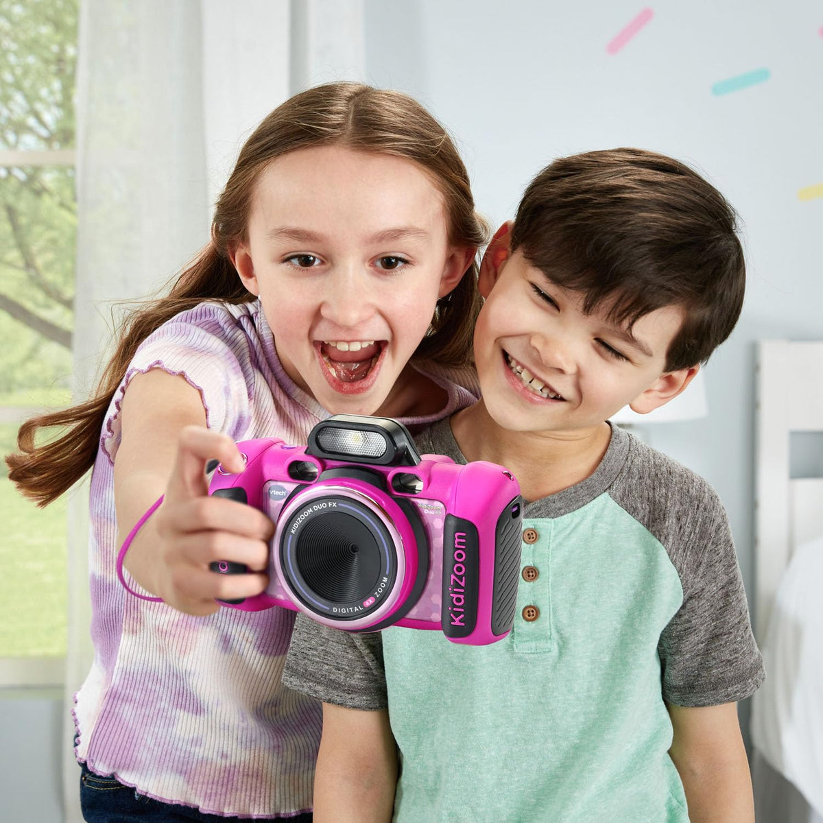 VTech KidiZoom Duo FX pink 4X zoom for close-up details.
