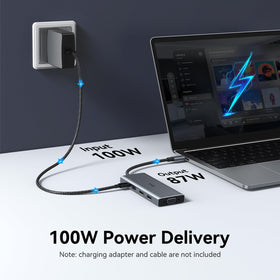 VVB dock held in hand to show compact size and portability for travel-friendly docking