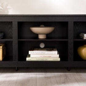 Adjustable shelves inside the Walker Edison Wren Classic 6-Cubby stand for flexible storage