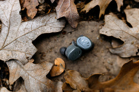 Locking fins on Walkers Suppressor Earbuds secure a snug fit during activity.