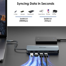 WAVLINK size comparison beside phone to show compact portable workstation capability