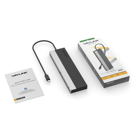 WAVLINK next to laptop to demonstrate compact scale and desk-friendly footprint