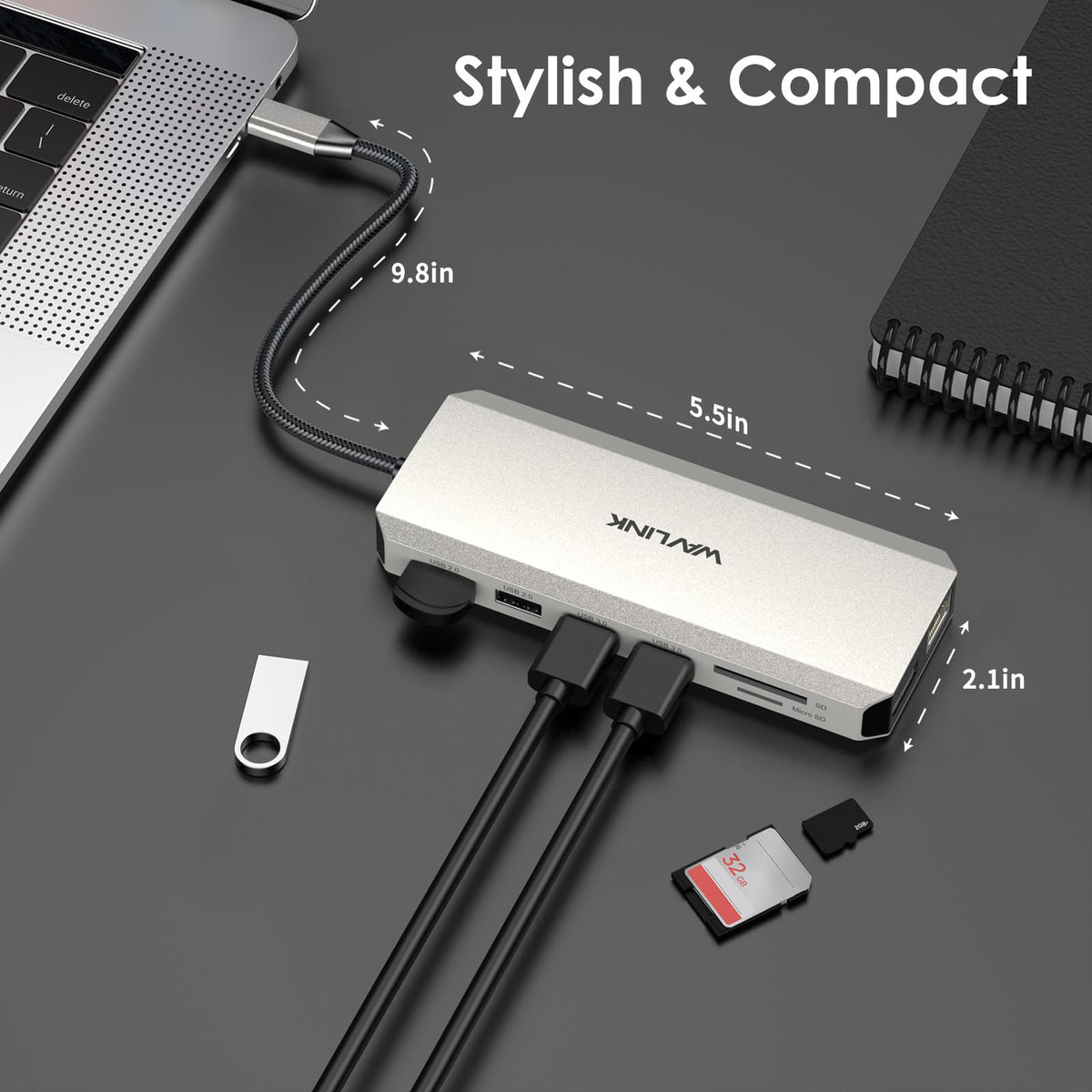 WAVLINK dock held in hand to show compact travel‑friendly size