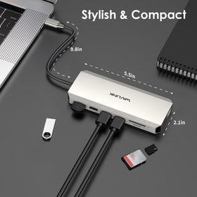 WAVLINK dock held in hand to show compact travel‑friendly size
