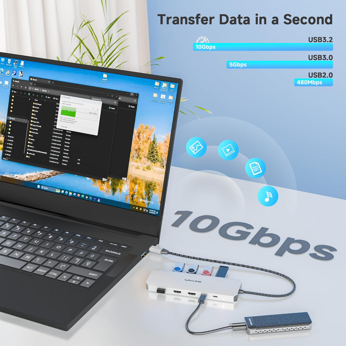 WAVLINK next to laptop for scale demonstrating compact space-saving design