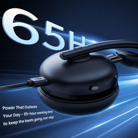 Waxop headset resting on laptop in office, illustrates reliable meeting-ready connectivity