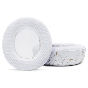 WC earpad next to coin for scale, demonstrates larger cushioning volume