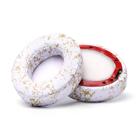 WC gold marble pads next to ruler showing correct dimensions for Beats Studio models