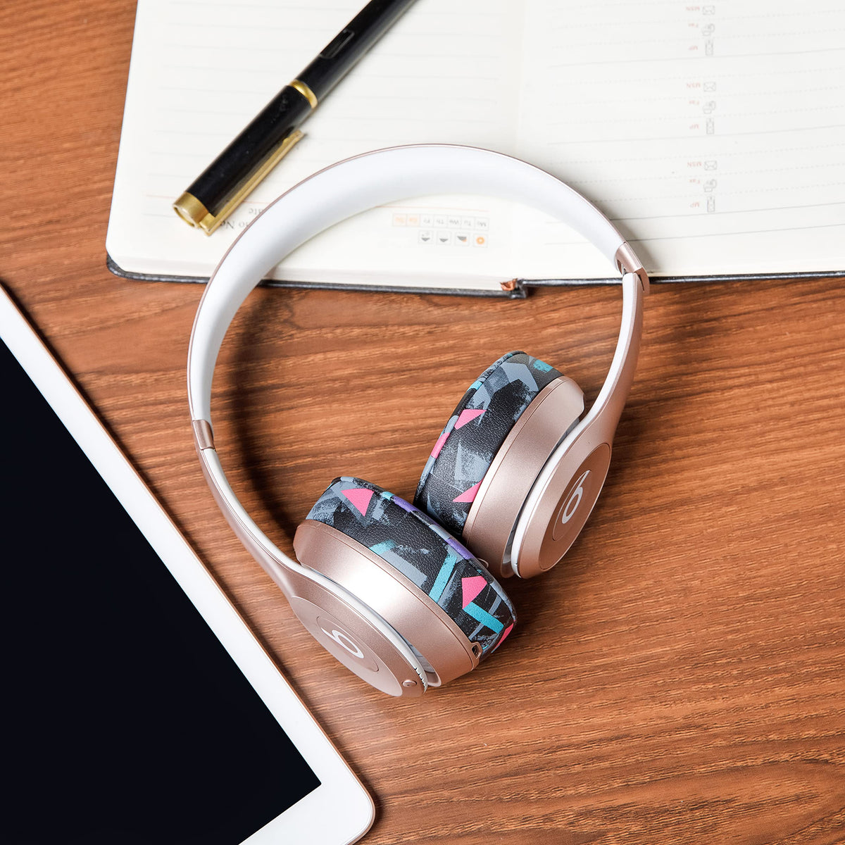 WC user wearing headphones with new earpads enjoying improved isolation